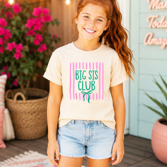 Big Sis Club coquette bow sibling reveal tee for girls in Natural, lifestyle view