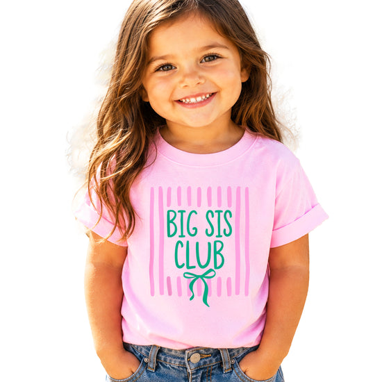 Big Sis Club coquette bow sibling reveal tee for girls in Pink, styled view