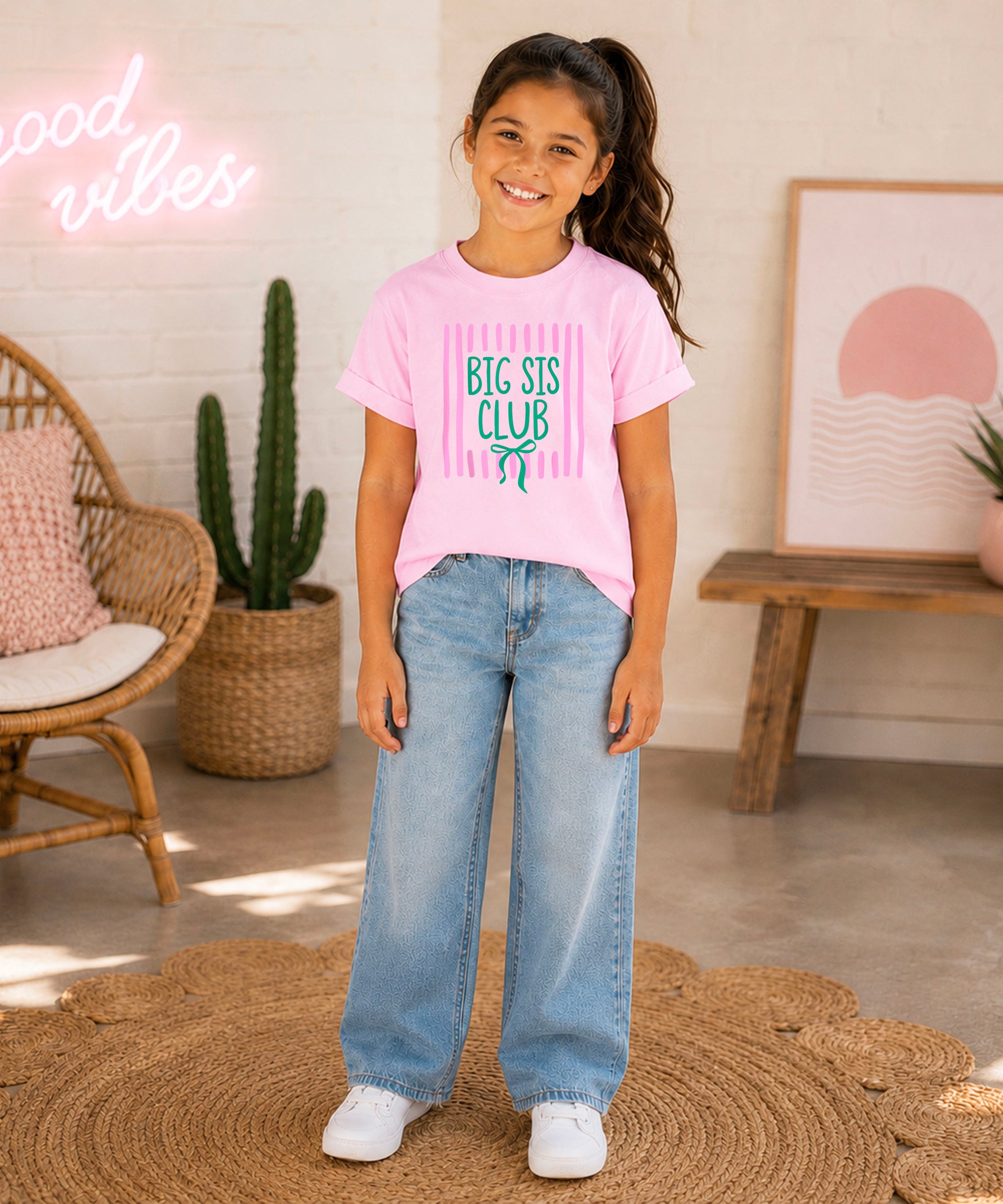Big Sis Club coquette bow sibling reveal tee for girls in Pink, lifestyle view