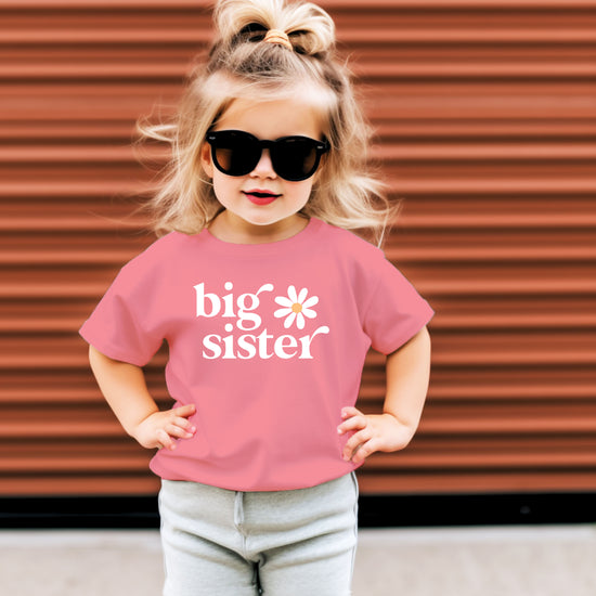 Big Sister Daisy sibling reveal tee for girls in Mauve, styled view