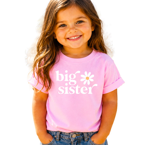 Big Sister Daisy sibling reveal tee for girls in Pink, front view
