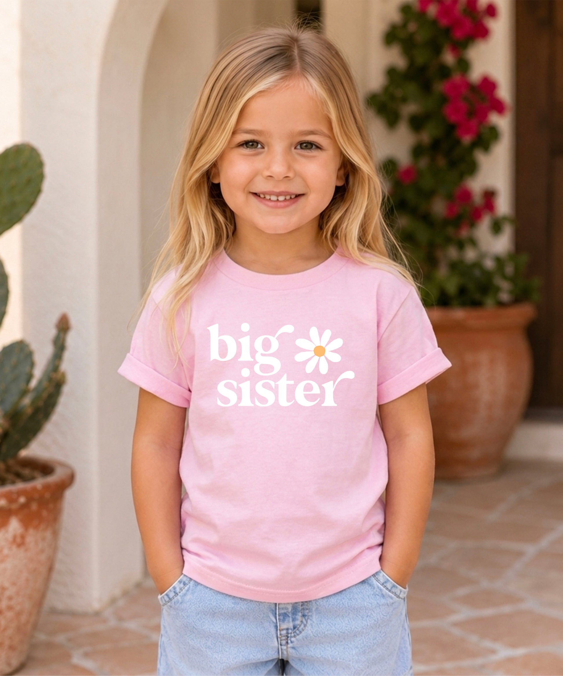 Big Sister Daisy sibling reveal tee for girls in Pink, lifestyle view