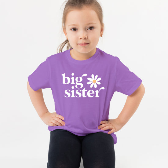 Big Sister Daisy sibling reveal tee for girls in Purple, styled view