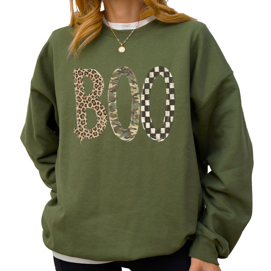 Halloween Boo sweatshirt in Army Green with leopard, camo and checkered boo graphic, lifestyle view