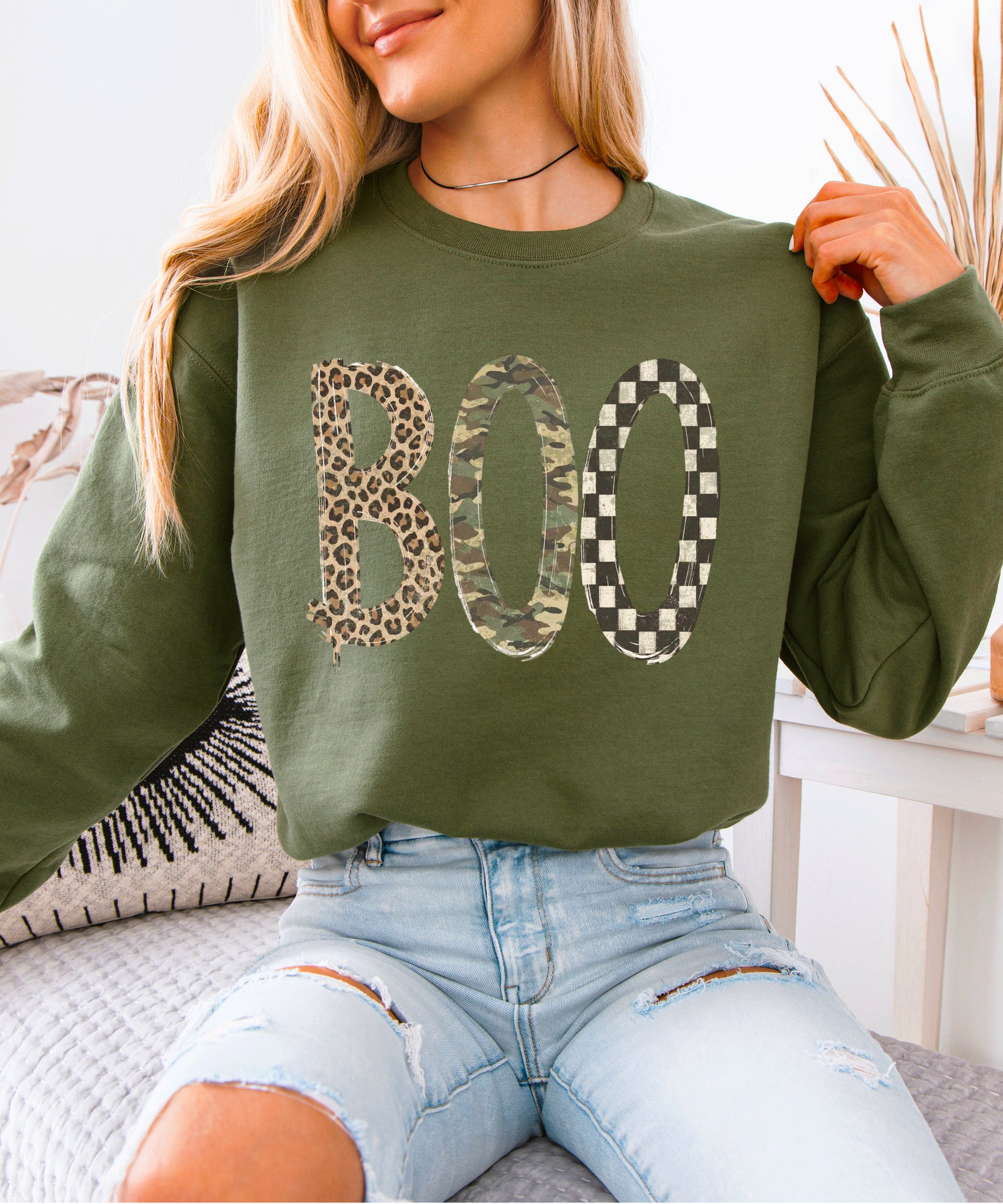 Halloween Boo sweatshirt in Army Green with leopard, camo and checkered boo graphic, design close-up