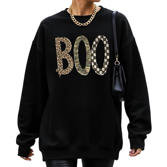 Halloween Boo sweatshirt in Black with leopard, camo and checkered boo graphic, lifestyle view