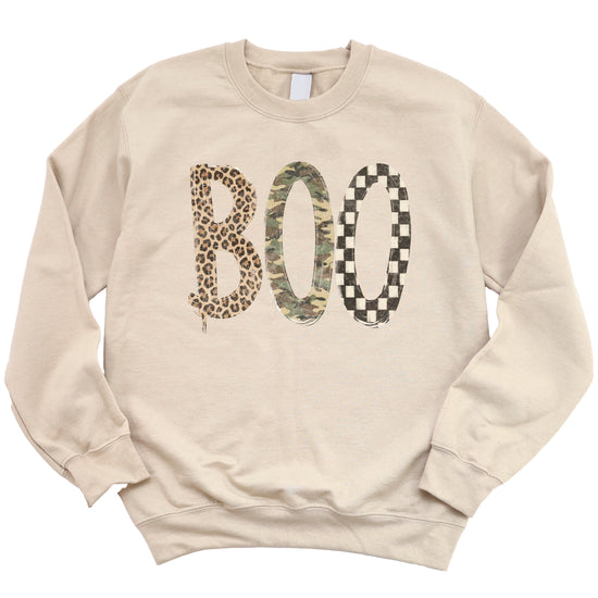 Halloween Boo sweatshirt in Sand with leopard, camo and checkered boo graphic, flat lay