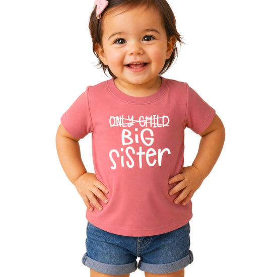 Only Child Big Sister shirt in Mauve, white crossed-out Only Child graphic, front view
