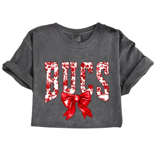 Bucs red floral bow school spirit tee, Pepper, close-up of ink-printed floral lettering and red coquette bow