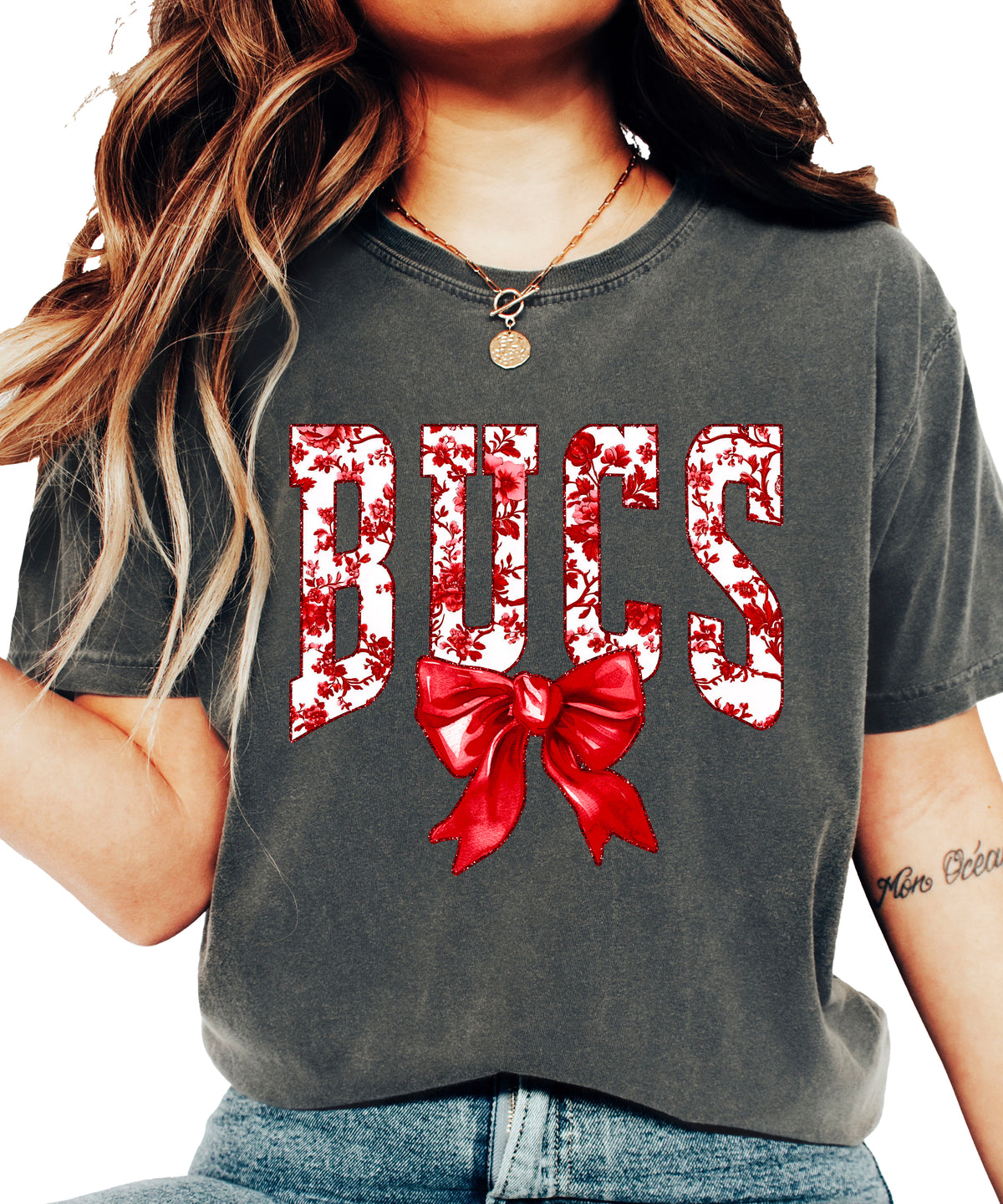 Bucs red floral bow school spirit tee in Pepper, styled lifestyle view