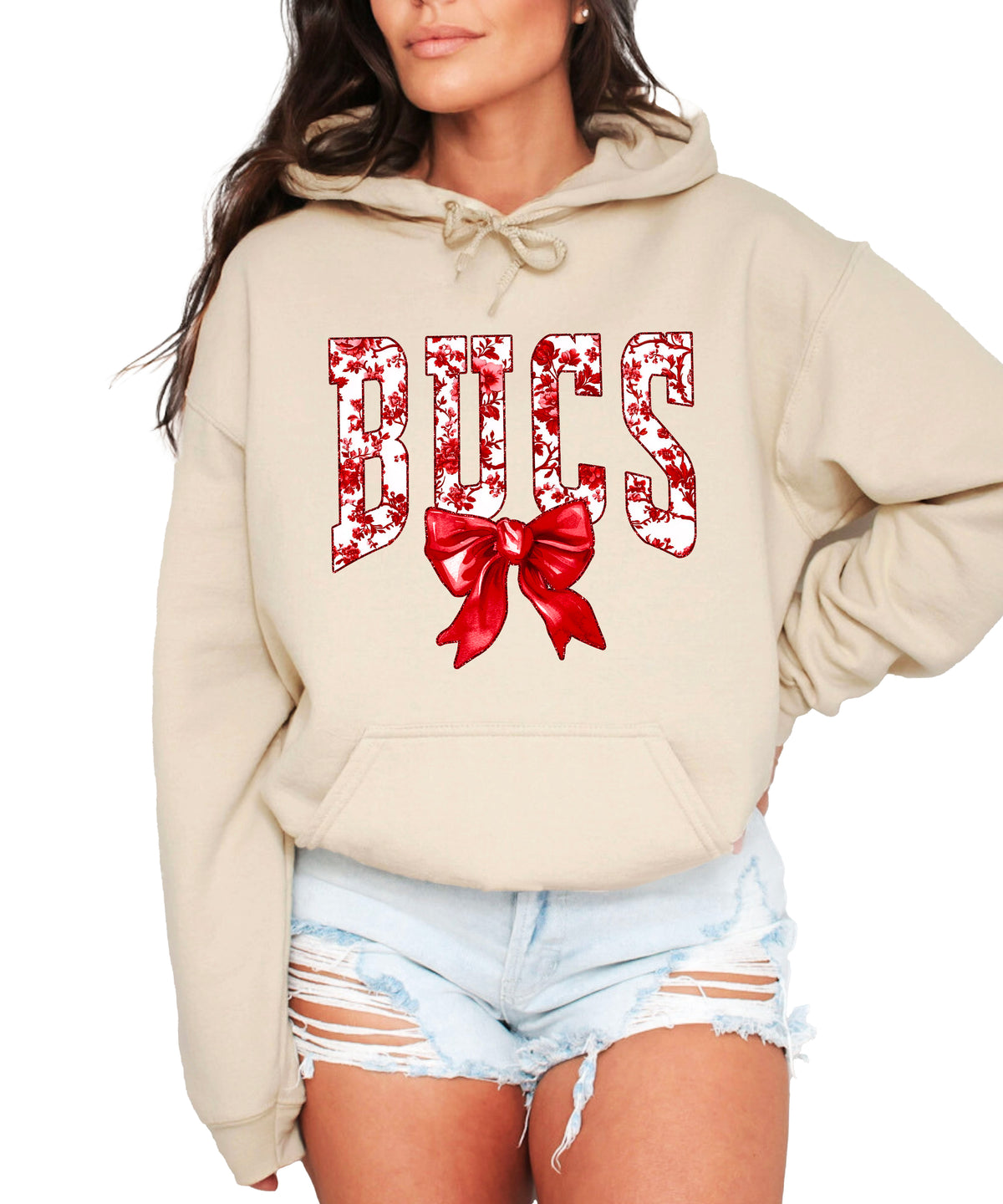 Sand hoodie front view with red floral BUCS varsity lettering and red bow