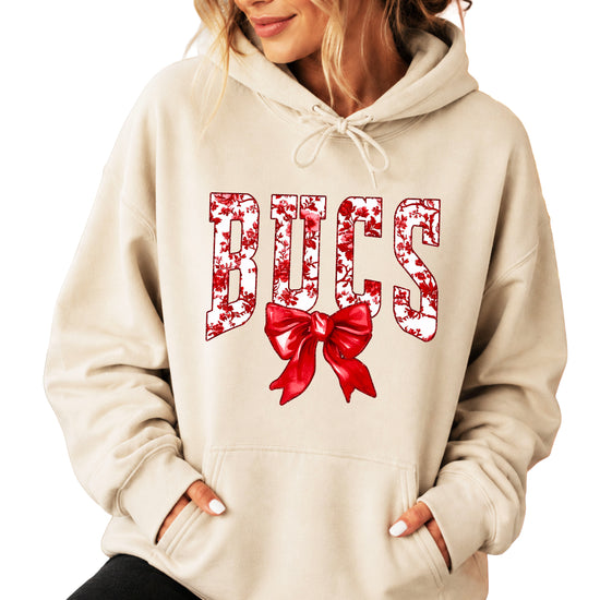 Sand hoodie detail of red and white floral BUCS letters
