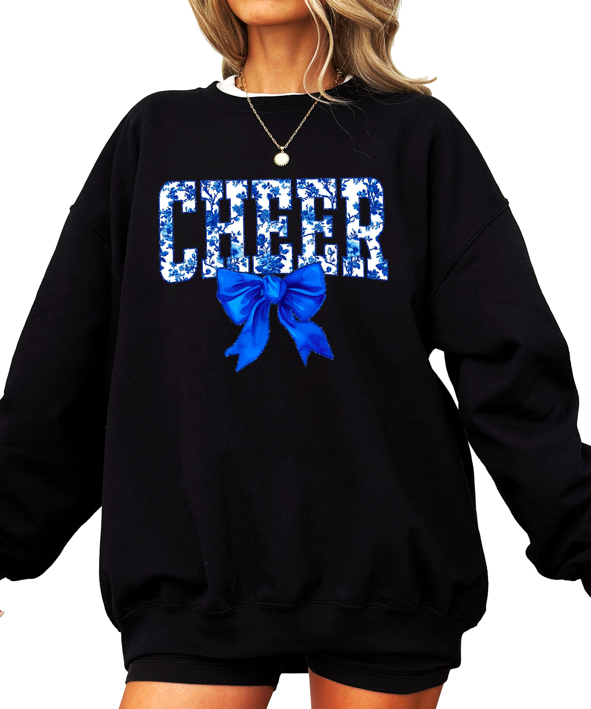 Black cheer crewneck sweatshirt with blue floral CHEER lettering and coquette bow