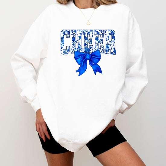 White cheer crewneck sweatshirt with blue floral CHEER lettering and coquette bow