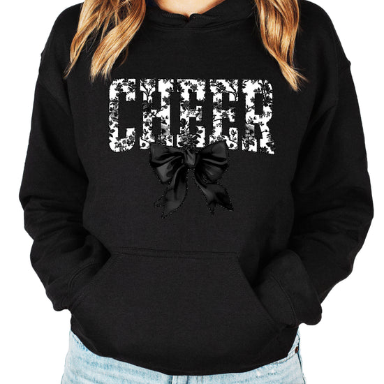 Black cheer hoodie for women and teen girls, ink-printed black and white floral CHEER letters with coquette bow, photo 1 of 4