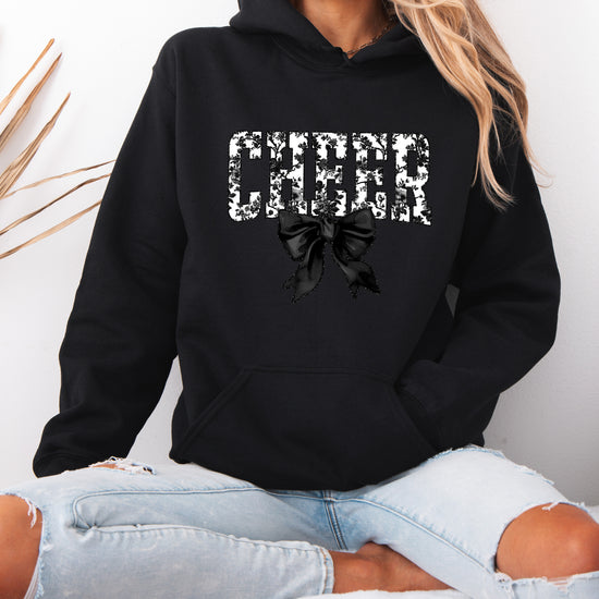 Black cheer hoodie for women and teen girls, ink-printed black and white floral CHEER letters with coquette bow, photo 3 of 4