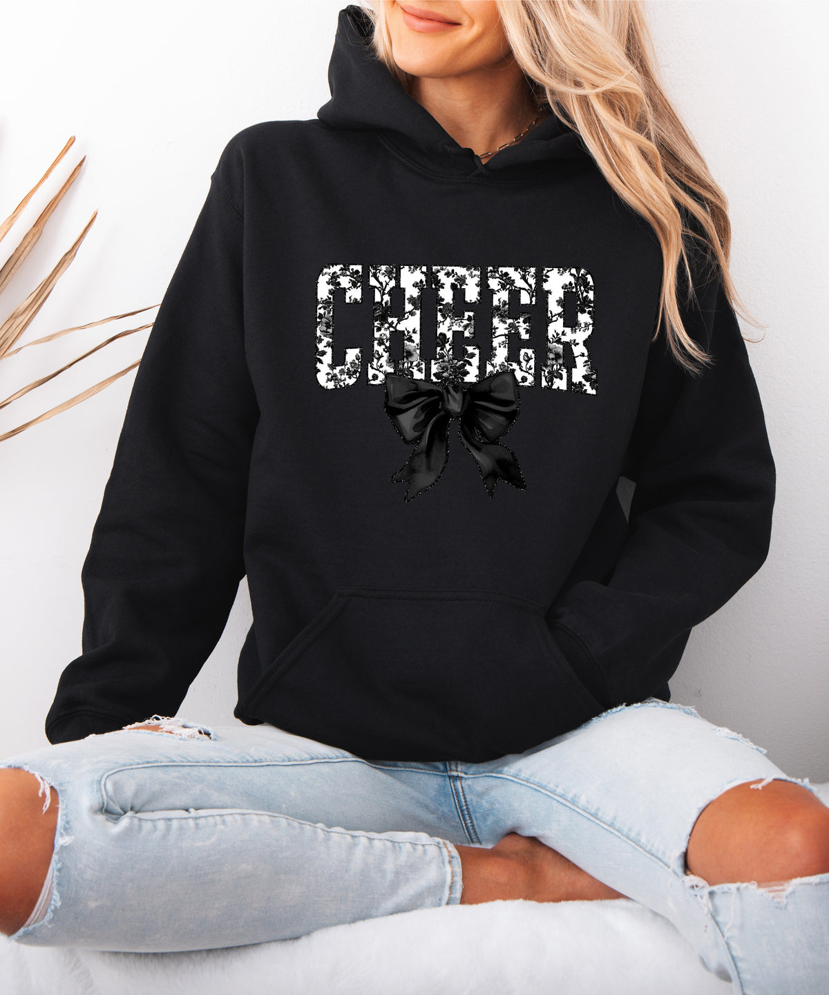 Black cheer hoodie for women and teen girls, ink-printed black and white floral CHEER letters with coquette bow, photo 3 of 4