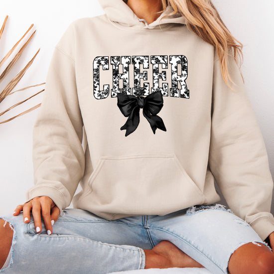 Sand cheer hoodie for women and teen girls, ink-printed black and white floral CHEER letters with coquette bow, photo 3 of 4
