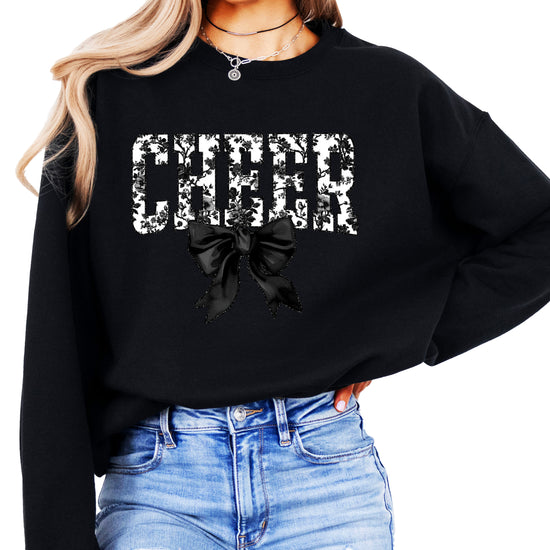 Black cheer sweatshirt with black floral bow design, detail view