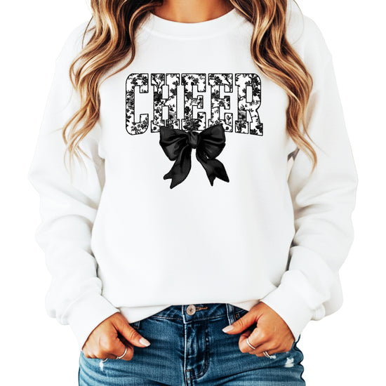 White crewneck sweatshirt with black floral CHEER varsity letters and coquette bow, front view