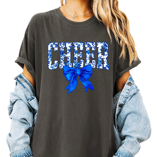 Cheer blue floral coquette bow Comfort Colors tee for women in Pepper, front view