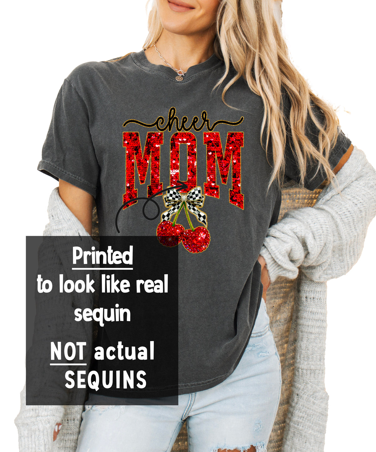 Cheerleader mom cherry coquette bow shirt, close-up of the ink-printed faux sequin design