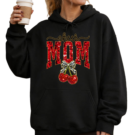 Black cheerleader mom hoodie for women with ink-printed cheer script, faux sequin MOM and cherry bow graphic - view 3
