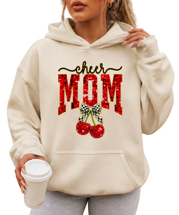 Sand cheerleader mom hoodie for women with ink-printed cheer script, faux sequin MOM and cherry bow graphic - front view