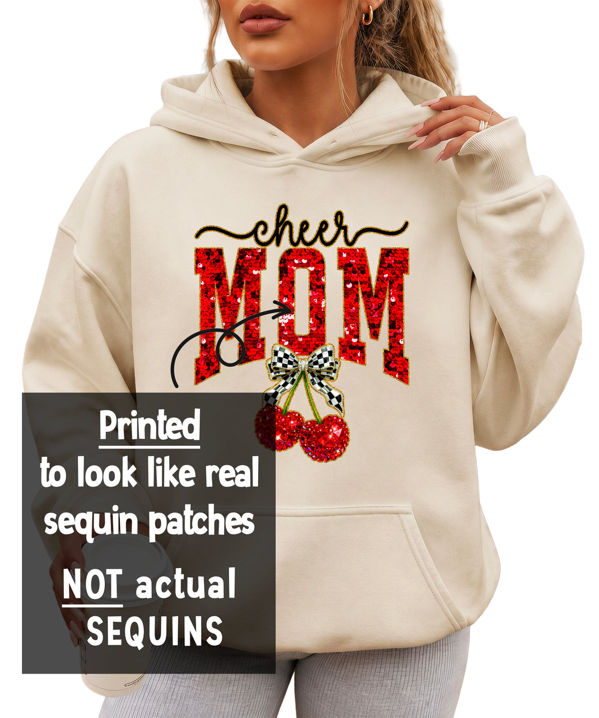 Cheerleader mom hoodie close-up of the ink-printed cheer script, faux sequin MOM letters and checkered bow cherries
