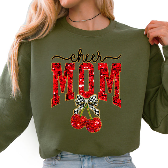 Army Green Cheerleader Mom crewneck sweatshirt with ink-printed faux sequin cheer script, MOM lettering and cherry coquette bow, front view