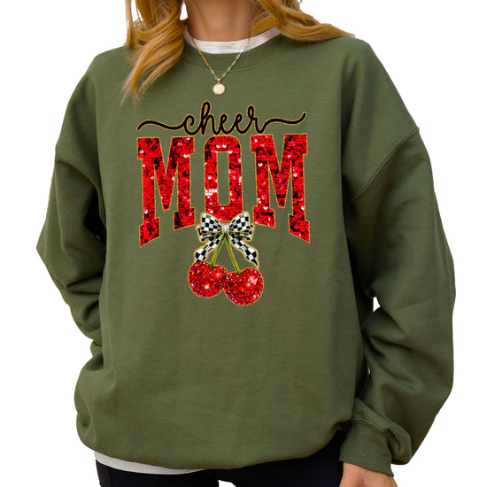 Army Green Cheerleader Mom crewneck sweatshirt with ink-printed faux sequin cheer script, MOM lettering and cherry coquette bow, styled detail view