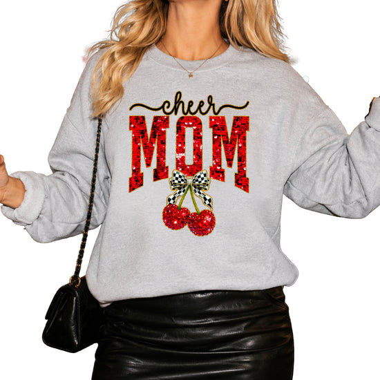 Gray Cheerleader Mom crewneck sweatshirt with ink-printed faux sequin cheer script, MOM lettering and cherry coquette bow, styled detail view