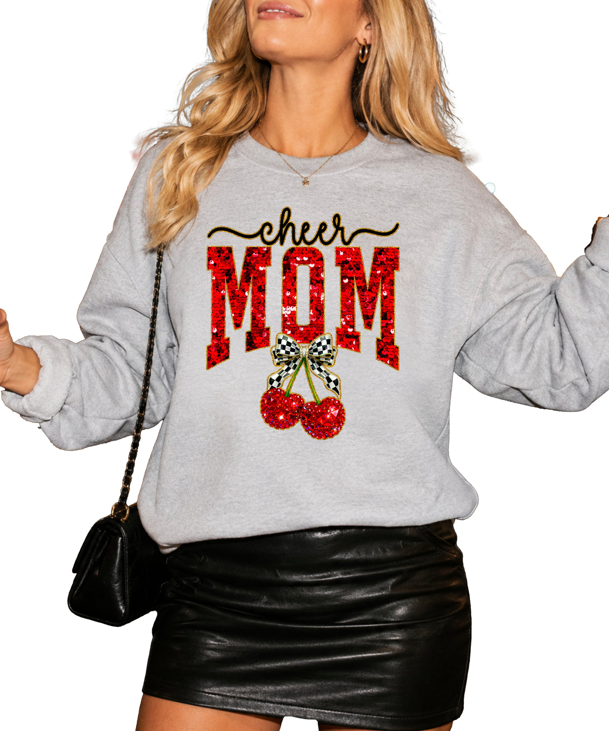 Gray Cheerleader Mom crewneck sweatshirt with ink-printed faux sequin cheer script, MOM lettering and cherry coquette bow, styled detail view
