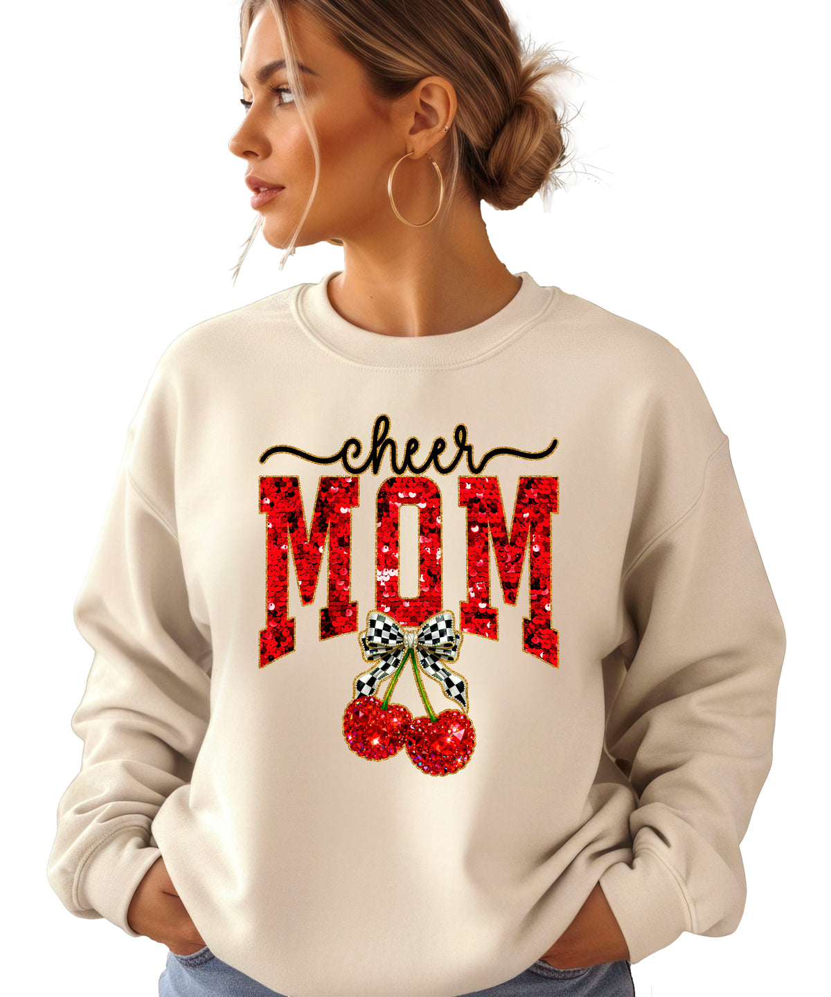Sand Cheerleader Mom crewneck sweatshirt with ink-printed faux sequin cheer script, MOM lettering and cherry coquette bow, styled detail view