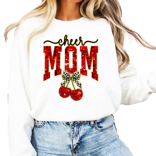 White Cheerleader Mom crewneck sweatshirt with ink-printed faux sequin cheer script, MOM lettering and cherry coquette bow, front view