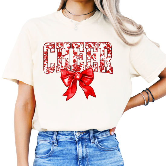 Cheer red floral coquette bow Comfort Colors tee for women in Ivory, front view