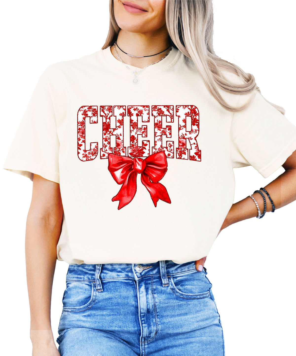Cheer red floral coquette bow Comfort Colors tee for women in Ivory, front view