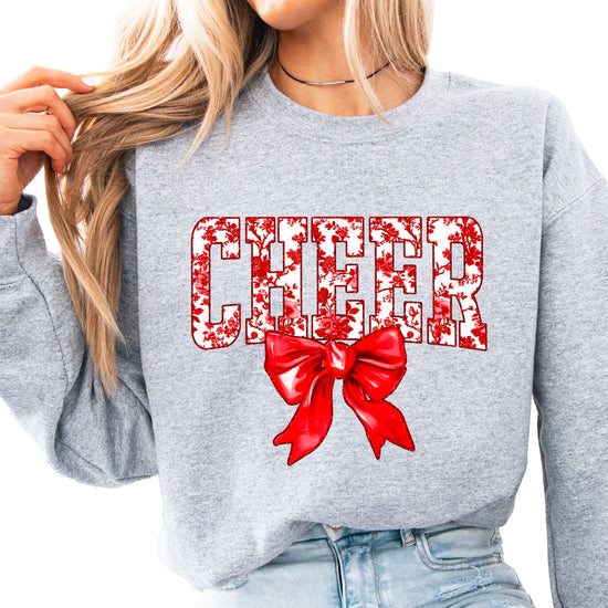 Gray crewneck sweatshirt with red floral CHEER lettering and red coquette bow, view 1