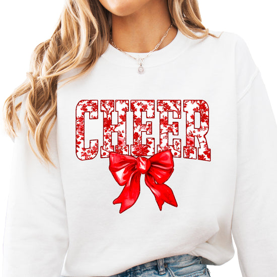 White crewneck sweatshirt with red floral CHEER lettering and red coquette bow, view 1