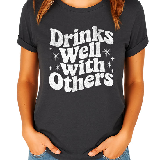Drinks Well With Others funny graphic tee for women in Dark Gray Heather, front view