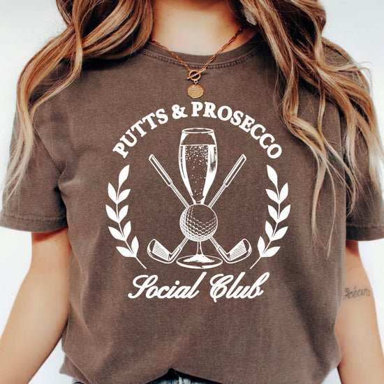 Putts and Prosecco Social Club golf t-shirt for women in Espresso brown, front view
