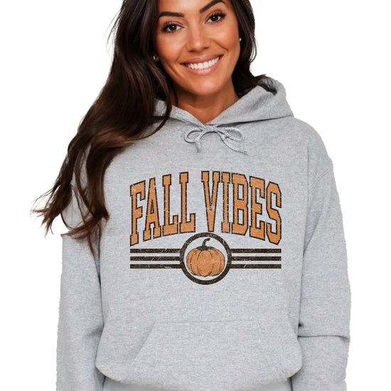 Fall Vibes vintage varsity pumpkin hoodie for women in Gray, styled view