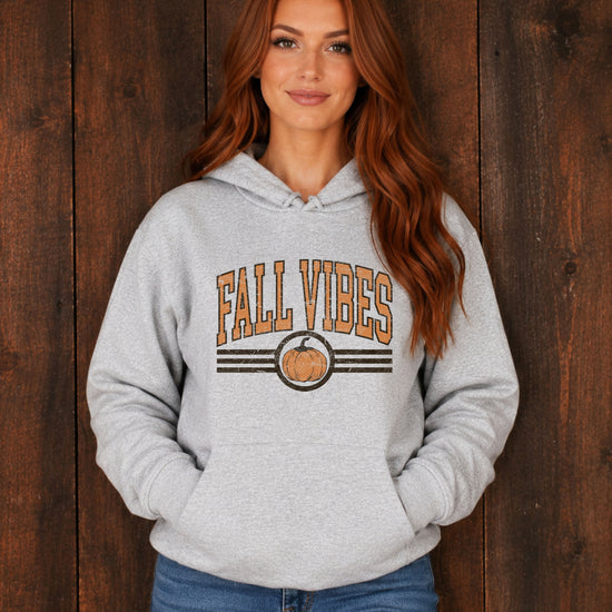 Fall Vibes vintage varsity pumpkin hoodie for women in Gray, lifestyle view