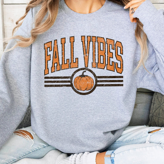 Fall Vibes retro pumpkin graphic crewneck sweatshirt in Gray, close-up texture