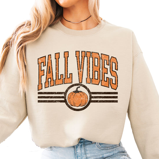 Fall Vibes retro pumpkin graphic crewneck sweatshirt in Sand, front view