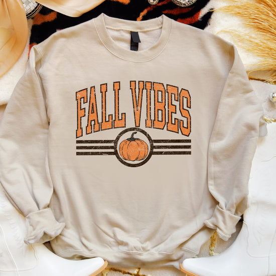 Fall Vibes retro pumpkin graphic crewneck sweatshirt in Sand, lifestyle shot