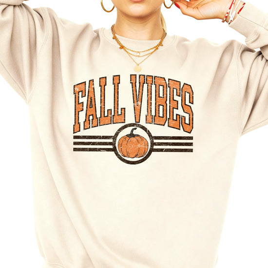 Fall Vibes retro pumpkin graphic crewneck sweatshirt in Sand, close-up texture