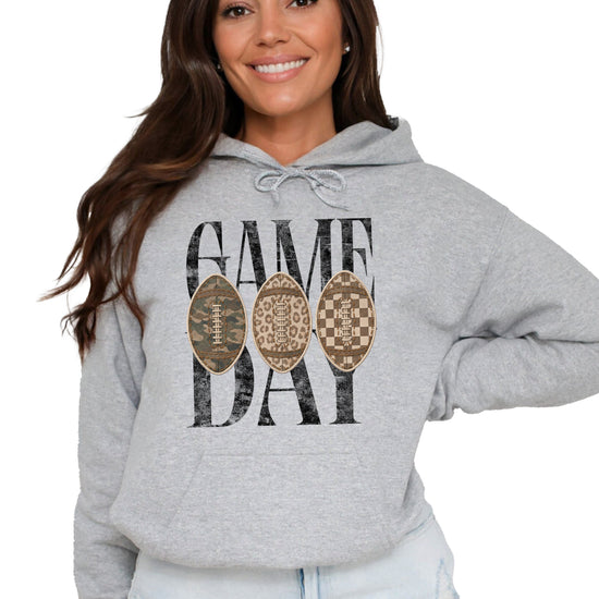 Game Day football hoodie for women in Gray with camo leopard checkered footballs, front view