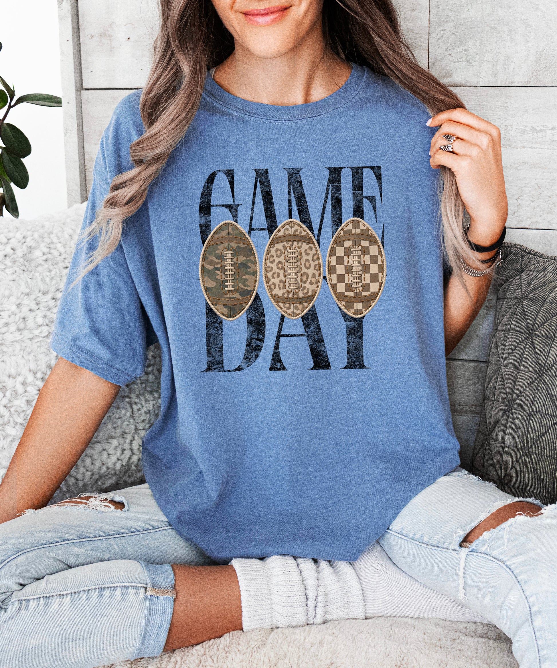 Game Day football shirt for women in Blue Jean, lifestyle view worn by a model, Comfort Colors 1717 garment-dyed heavyweight cotton tee by Olive Loves Apple