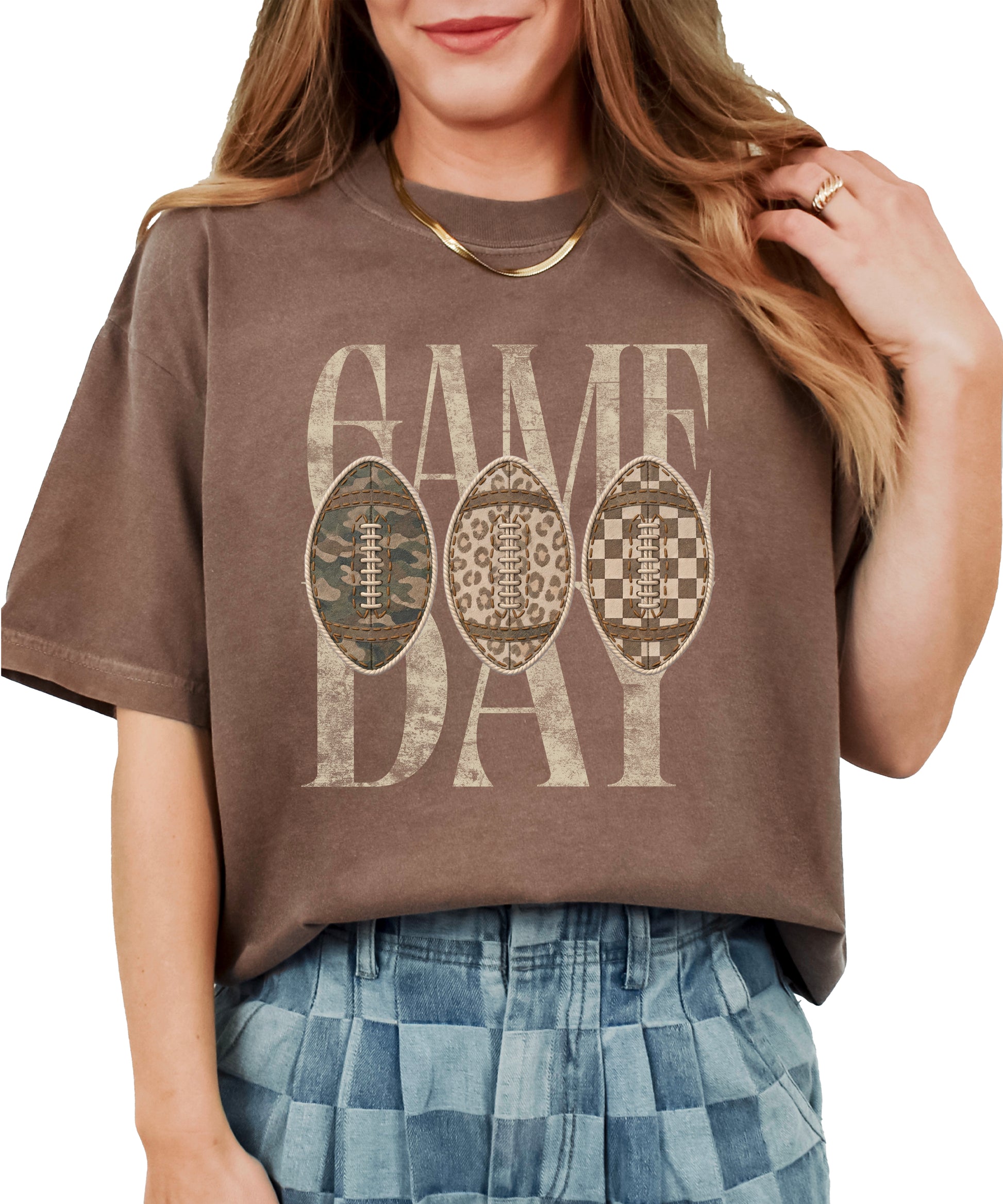 Game Day football shirt for women in Espresso, lifestyle view worn by a model, Comfort Colors 1717 garment-dyed heavyweight cotton tee by Olive Loves Apple